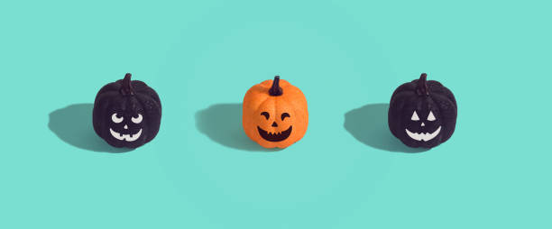 istock Halloween holiday creative background with jack o lantern glitter pumpkin 1174832654