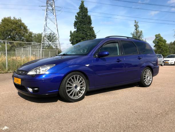 Blue Ford Focus wagon serie 1. stock photo