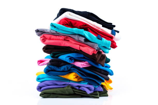istock Stack of Colorful cotton T-shirt isolated on white background. 1174838627