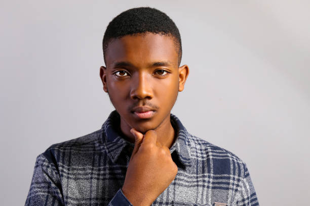 istock Handsome dark skin guy posing over isolated background. 1174846126