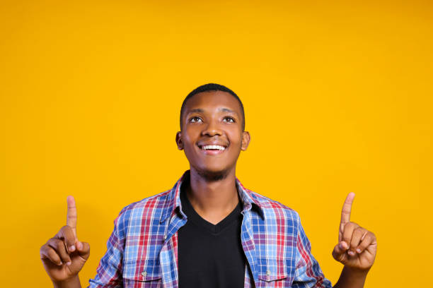 istock Handsome dark skin guy posing over isolated background. 1174846191