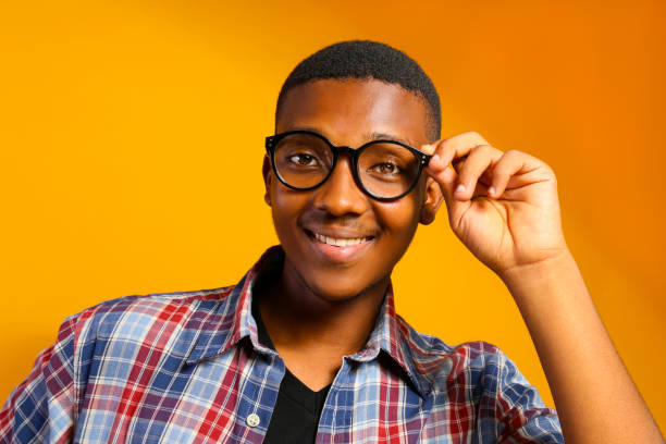 istock Handsome dark skin guy posing over isolated background. 1174846205