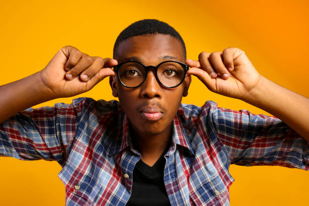 istock Handsome dark skin guy posing over isolated background. 1174846228