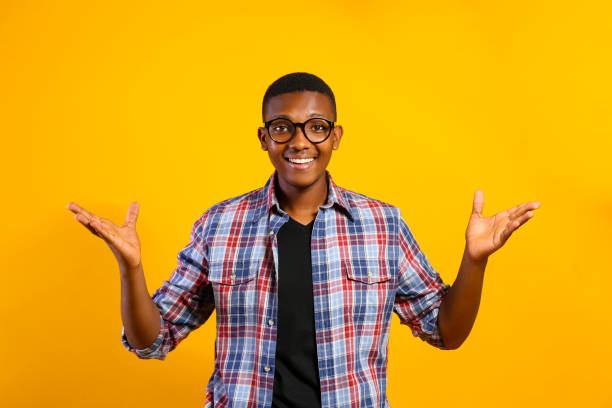 istock Handsome dark skin guy posing over isolated background. 1174846265