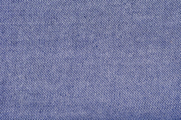 istock Texture of Denim jeans fabric background . 1174848562