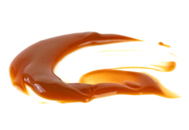 istock Caramel sauce isolated on a white background 1174849435