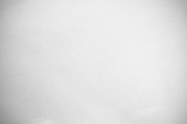istock Old texture paper white cardboard sheet of empty paper white background. 1174849482