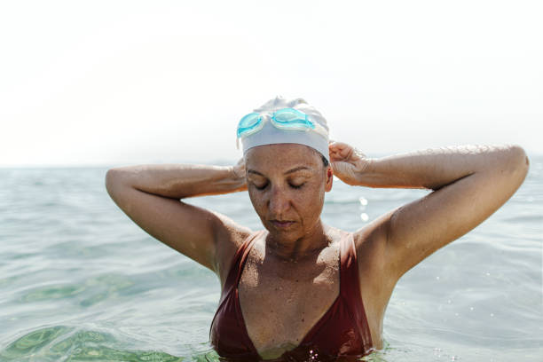 istock Female swimmer after diving 1174852221