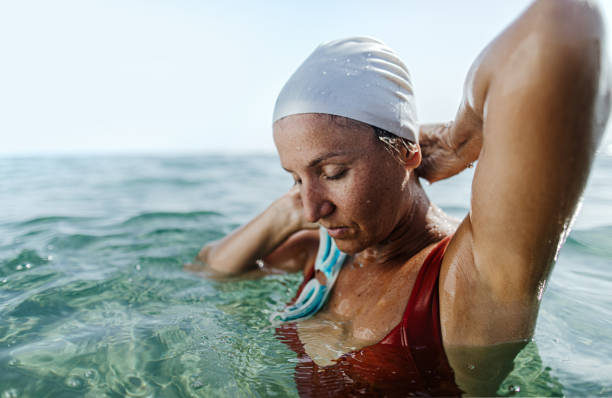 istock Female swimmer after diving 1174852256