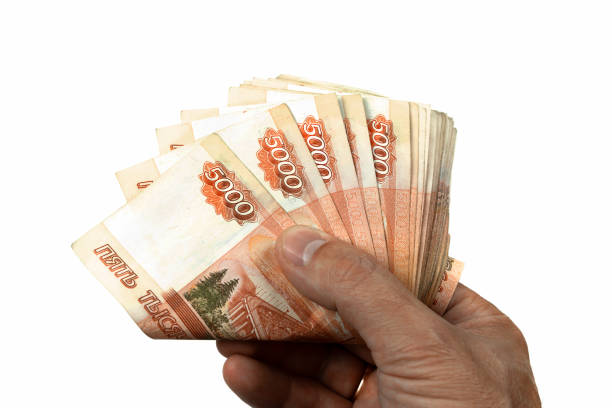 istock Banknotes five thousand rubles counting by hands. On a white isolated background paper money of Russia. Counting money. 1174853587