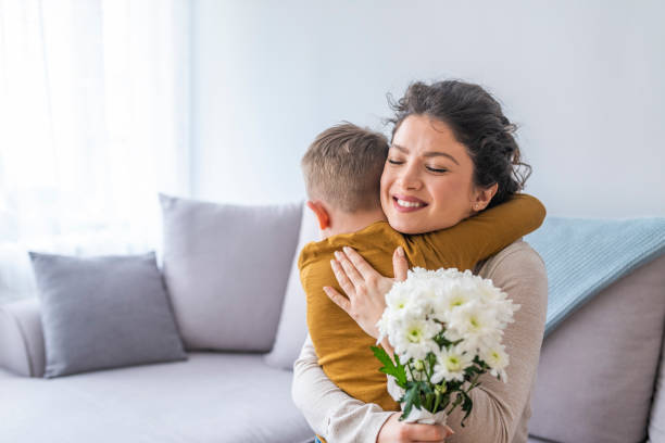 istock Mother hugging her child 1174853804