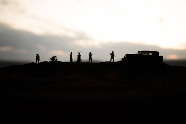 istock War concept. Creative composition. Silhouette of German general at the desert. Army commanders watching to the battle. 1174856139