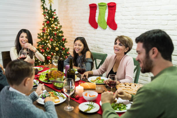 istock Family Enjoying Dinner Party At Home 1174857205
