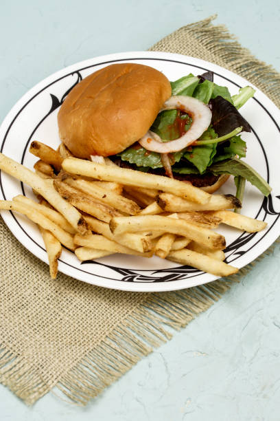 istock Burger with French Fries 1174859677