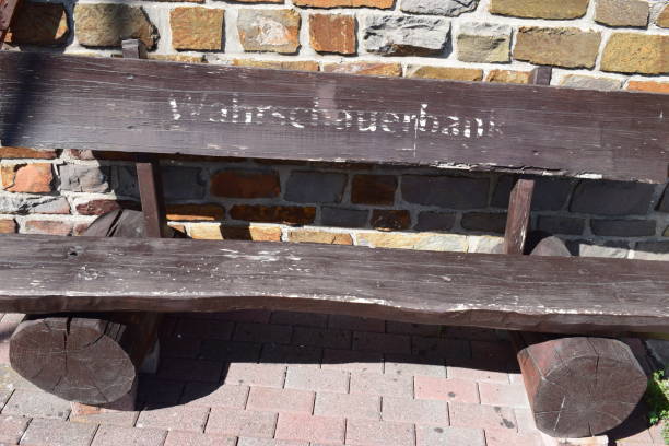 istock old wooden parkbench 1174862739