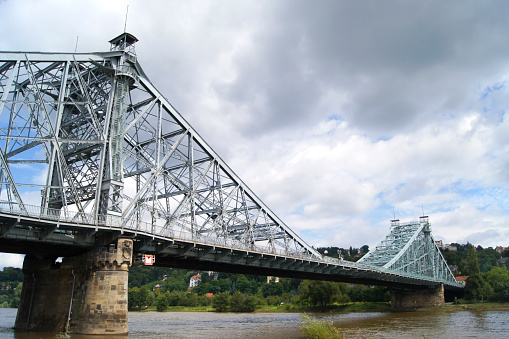 The bridge is called 'Blaues Wunder' because of its colour and is a cantilever truss bridge.
