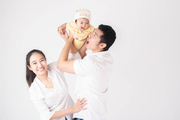 Happy Asian family are enjoy with son in studio