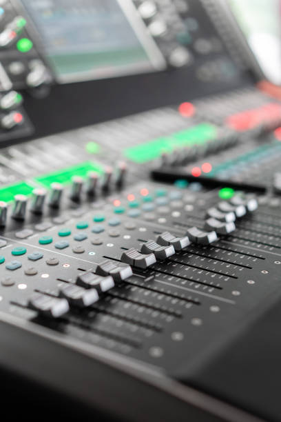 istock Music mixer equalizer console for mixer control sound device. Sound technician audio mixer equalizer control. Mastering For Radio and TV Broadcast. 1174870430