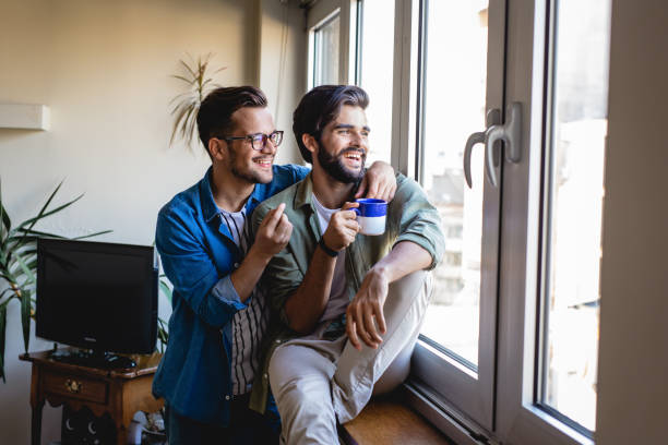 istock Gay men couple at home 1174871646