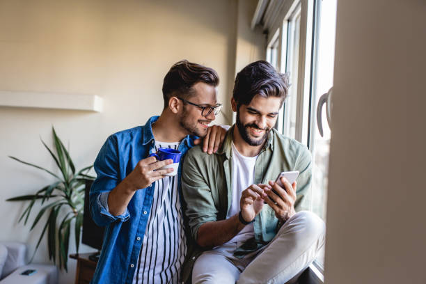istock Gay men couple at home 1174871776