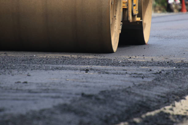 istock Road construction asphalt road by worker and roller machine. Asphalt road background 1174871952