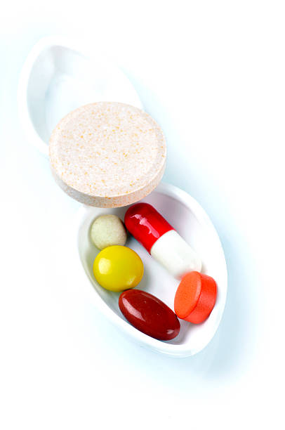 pigułki - vitamin pill capsule pill echinacea zdjęcia i obrazy z banku zdjęć