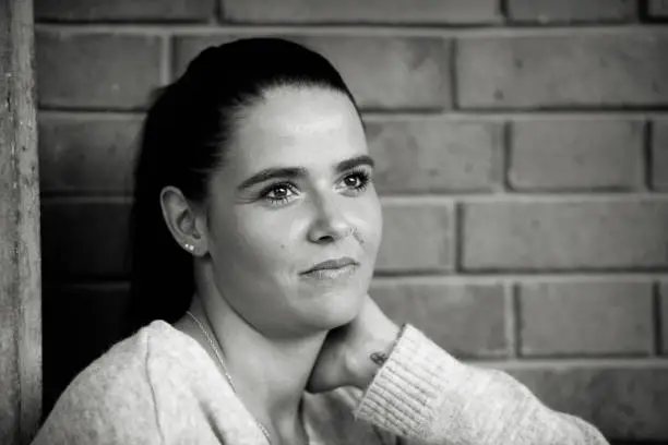 Photo of Serious young woman portrait