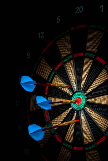 istock darts stuck in an electronic dartboard 1174876643