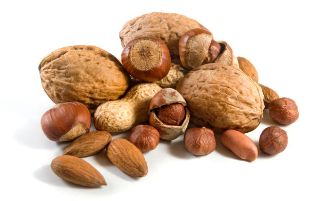 istock Isolated image of nuts on a white background closeup 1174876926