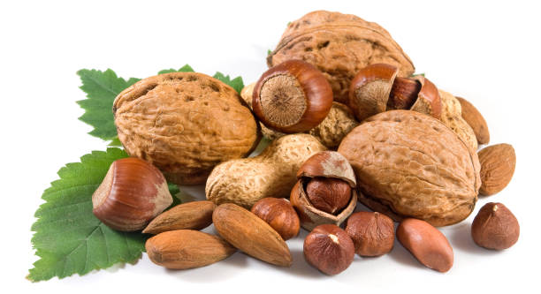 istock Isolated image of nuts on a white background closeup 1174877731
