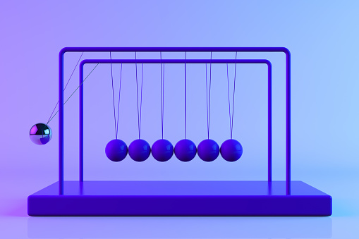 3d rendering of Newton's Cradle, shiny, metallic balancing balls, pendulum. Leadership teamwork concept. Blue and purple colors.