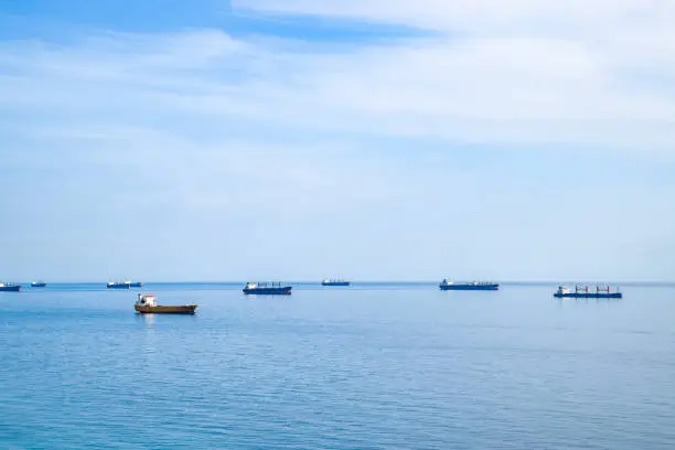 Cargo ships and barges at sea, a squadron of cargo ships. Tsemes Bay,