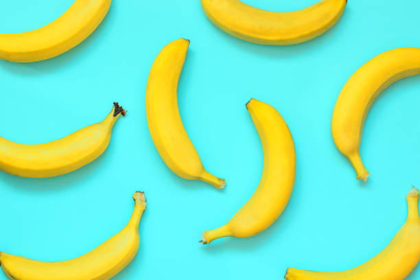 istock Many ripe natural bananas on a color background 1174881537