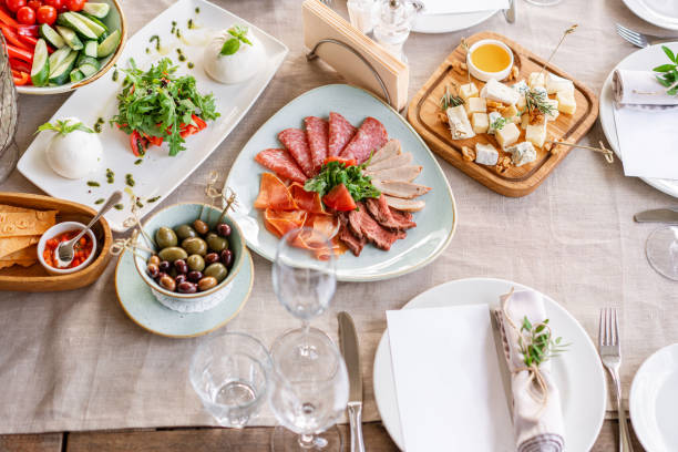 istock Gala dinner, serving table for birthday or wedding. Different meals for the guests on Banquet. delicious dishes on the table in the restaurant. 1174881746