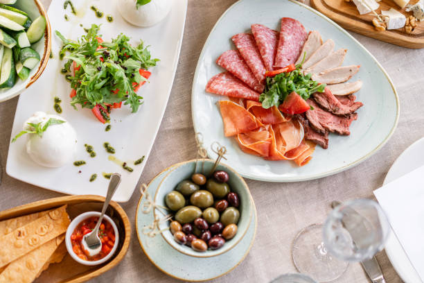 istock Gala dinner, serving table for birthday or wedding. Different meals for the guests on Banquet. delicious dishes on the table in the restaurant. 1174882277