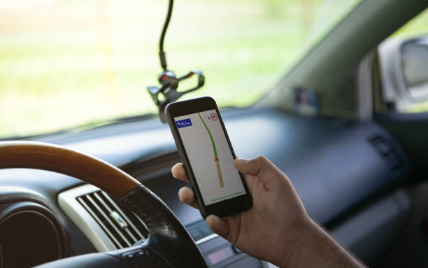 istock driver tries to find the right way using GPS 1174882740
