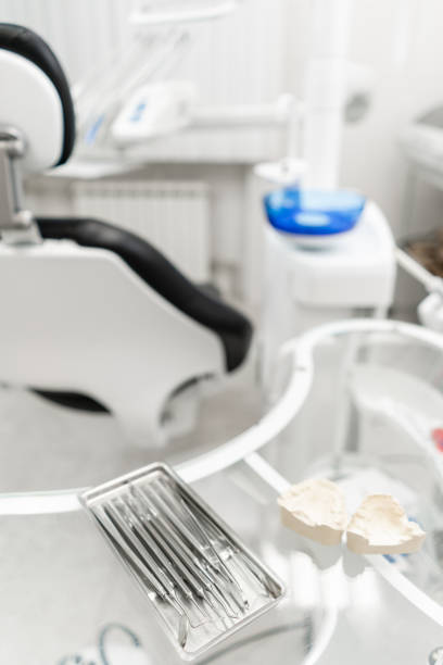 istock Stomatological tools in the dentists clinic. Dental work in clinic. Operation, tooth replacement. Medicine, health, stomatology concept. Office where dentist conducts inspection and concludes. 1174888333