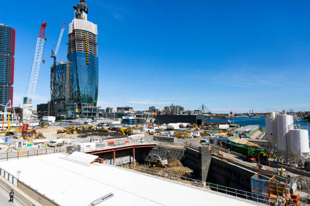 Barangaroo construction site of Crown casino, background with copy space Sydney, Australia - September 15, 2019: Barangaroo construction site of Crown casino with construction machinery construction skyscraper machine industry stock pictures, royalty-free photos & images