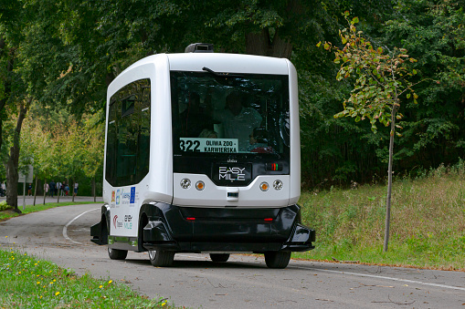 Gdansk, Poland - September 15th, 2019: Autonomous bus EasyMile EZ10 in motion on the street. This vehicle demonstrates how will be look the autonomous transport in future.