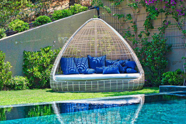 istock Round rattan Sofa at the pool 1174890778