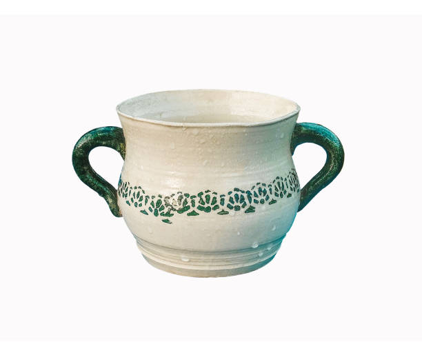 istock Ceramic bowl with two handles. Drops of water on the glazed surface. 1174891015