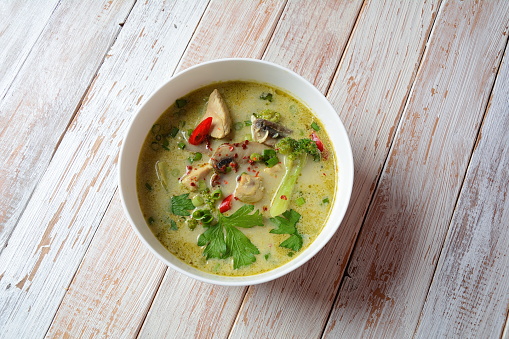 Traditional Thai cuisine, Thai Spicy Green curry chicken soup with coconut milk, mushrooms and broccoli. Healthy food