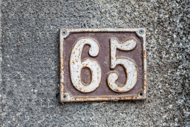 istock Street number sign on the wall 1174893479