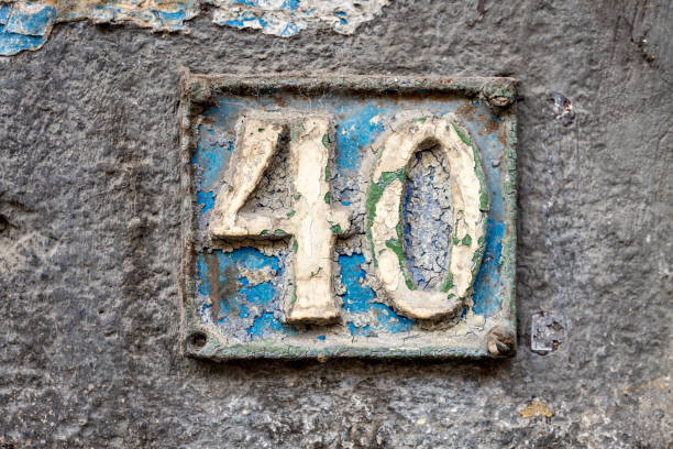 istock Street number sign on the wall 1174893498
