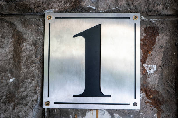 istock Street number sign on the wall 1174893503