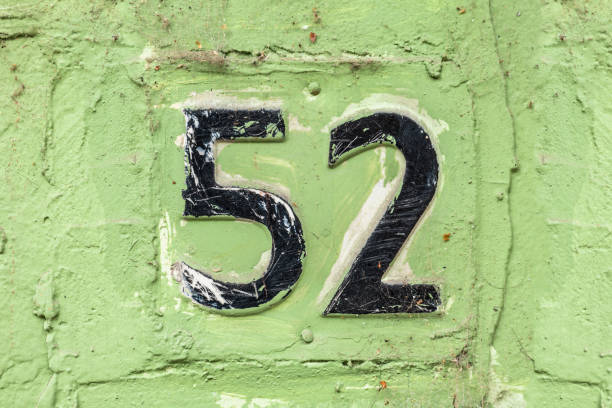 istock Street number sign on the wall 1174893547