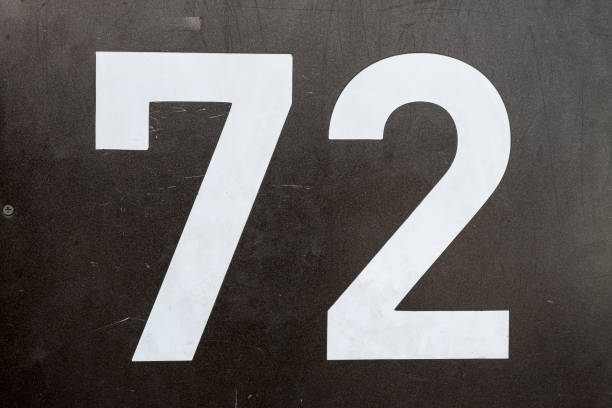 istock Street number sign on the wall 1174893549
