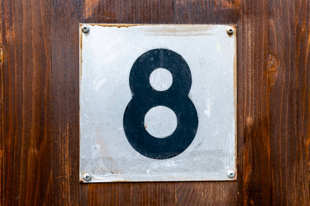 istock Street number sign on the wall 1174893894