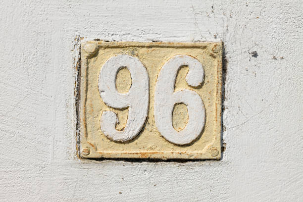 istock Street number sign on the wall 1174893895