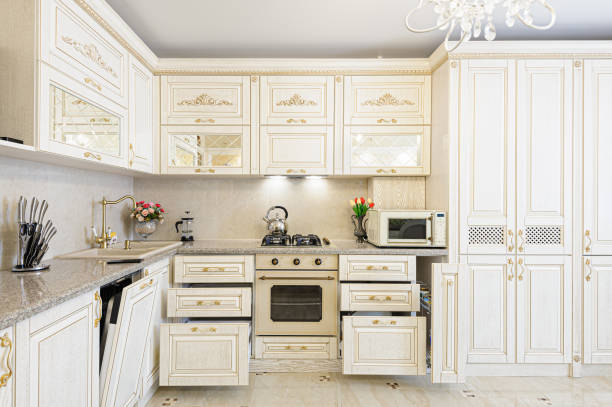 istock Luxury modern beige and cream colored kitchen interior 1174893932